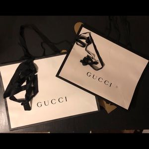 Two authentic Gucci shopping bags w/ Gucci ribbon